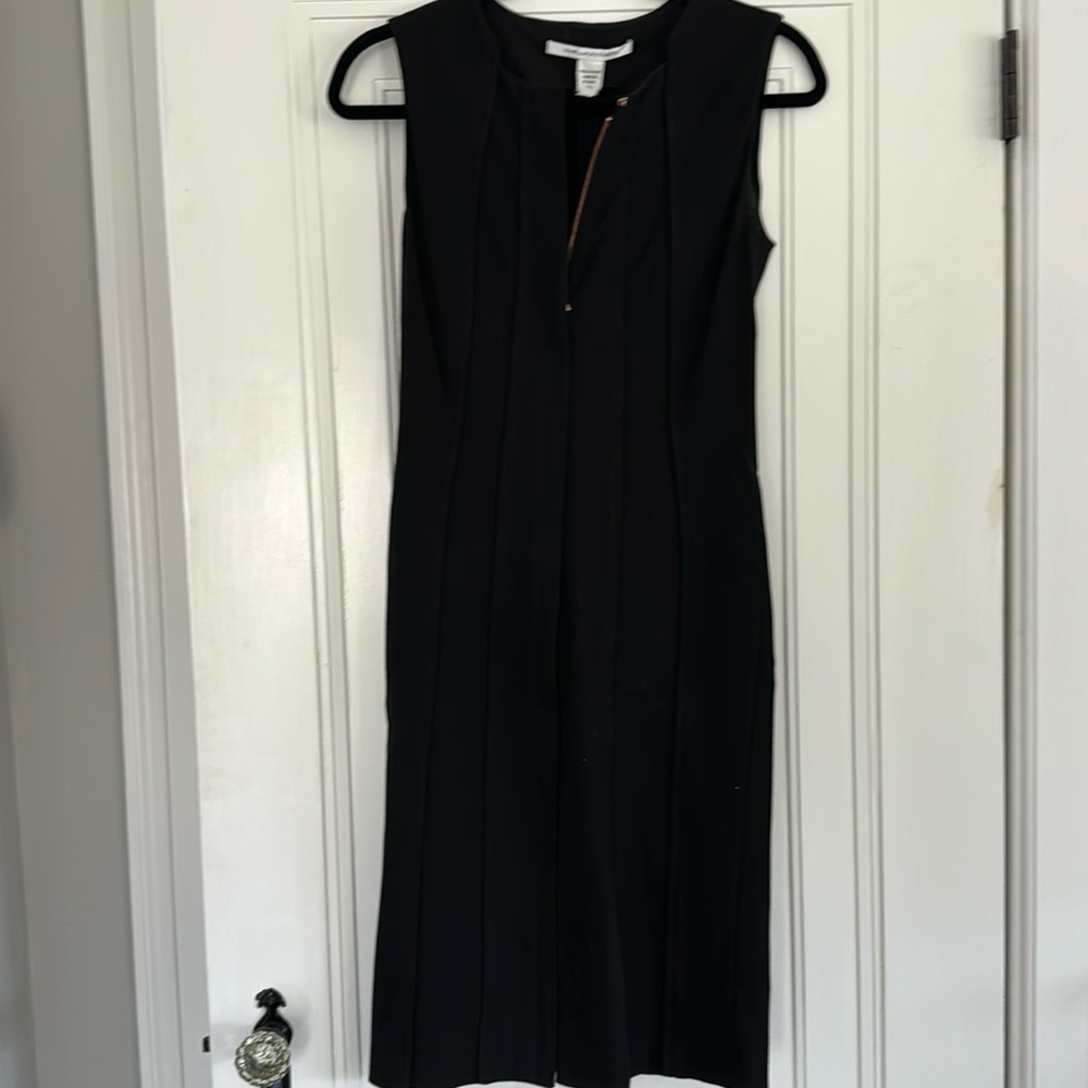 DVF fitted black dress with pleats and zipper from top to bottom